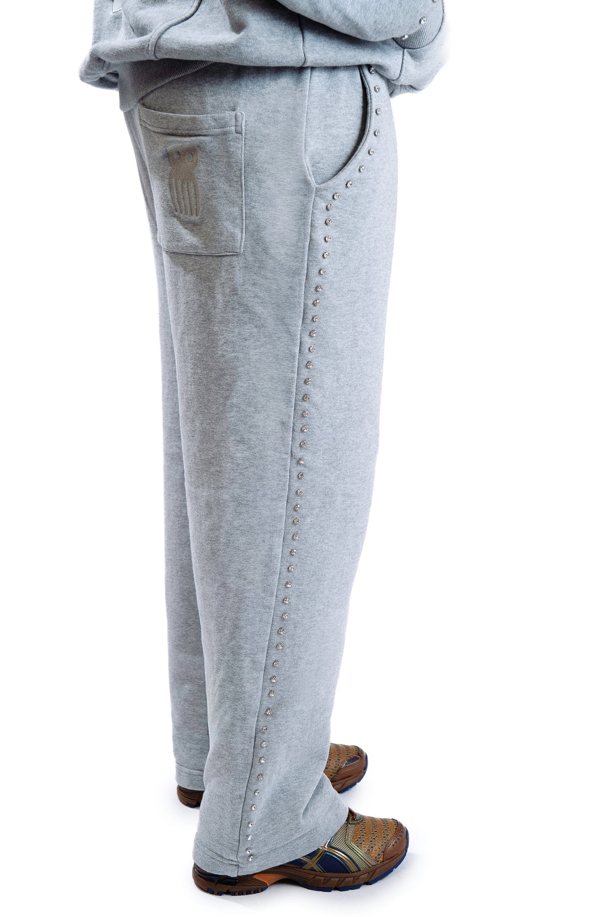 Model wearing CHACHI Signature Joggers in gray
